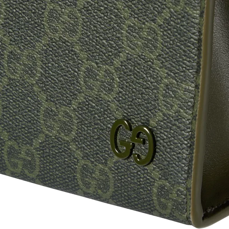 GUCCI GG logo patterned small clutch bag